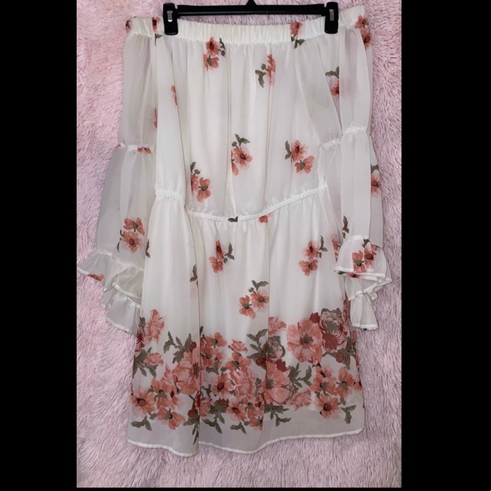 White, Pink, and Green Dress With Slightly Ruffled Sleeves.